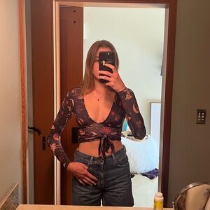 Printed v neck cropped long sleeve from Urban Outfitters.